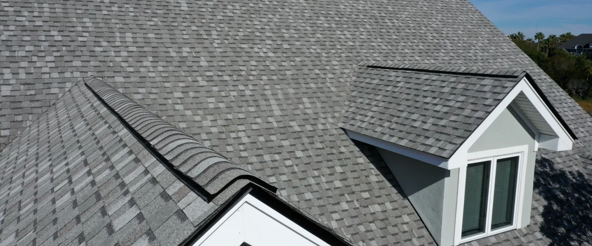 shingles rooftop and sidings installed on a house